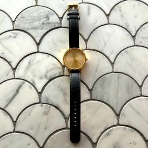 Nixon The Kensington Watch Woman Gold Tone Dial Black Leather Band